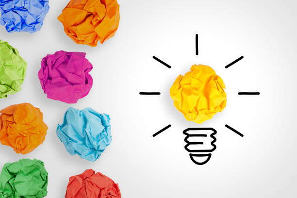 istock Creative Idea Concepts Light Bulb Crumpled Paper on White Background 1148707096