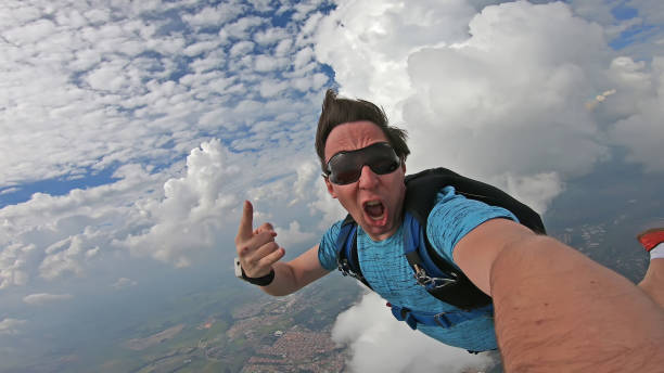 istock Skydiver selfie with clouds at the background 1148712492