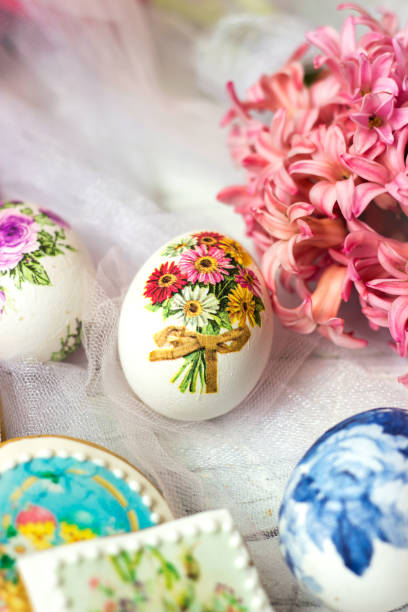 Easter eggs decorated with colorful paper tissues;  decoupage technique
