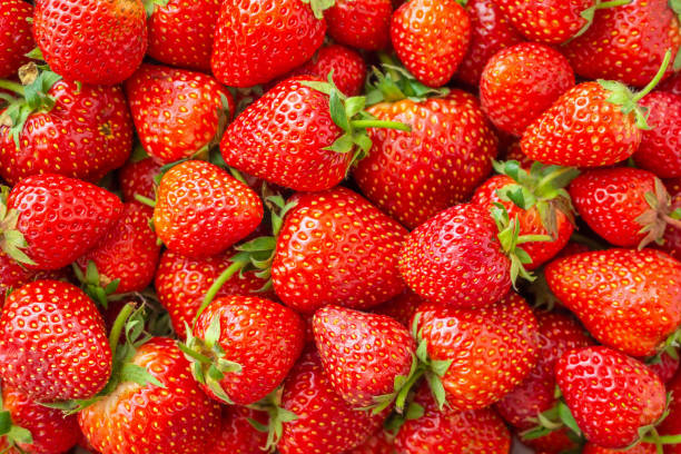 istock Fresh organic Strawberry fruit background Top view closeup 1148713427