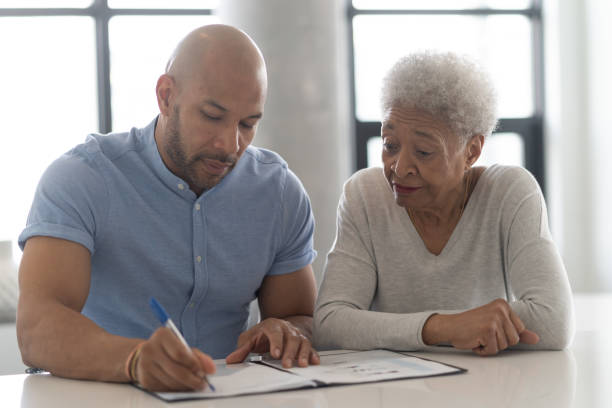 istock Male Financial Advisor With Senior Client 1148713494