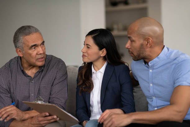 istock Male Financial Advisor Talking To Clients 1148713502