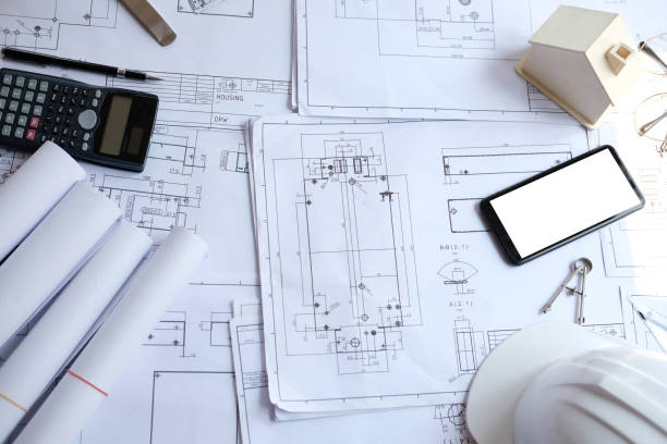 istock house blueprint of real estate project at architect engineer  workplace. building & construction concept 1148714451