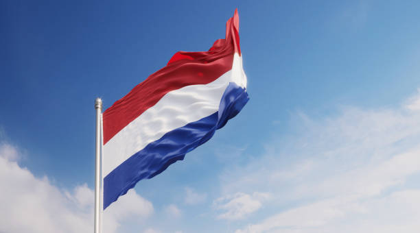 istock Dutch Flag Waving With Wind Over Blue Sky 1148715686