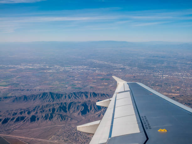 istock Commercial Airplane Making a Left Turn Over Phoenix Arizona 1148715689