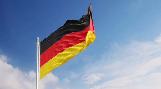 istock German Flag Waving With Wind Over Blue Sky 1148718583
