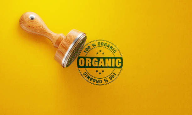 istock Wooden Organic Stamp On Yellow Background 1148721072
