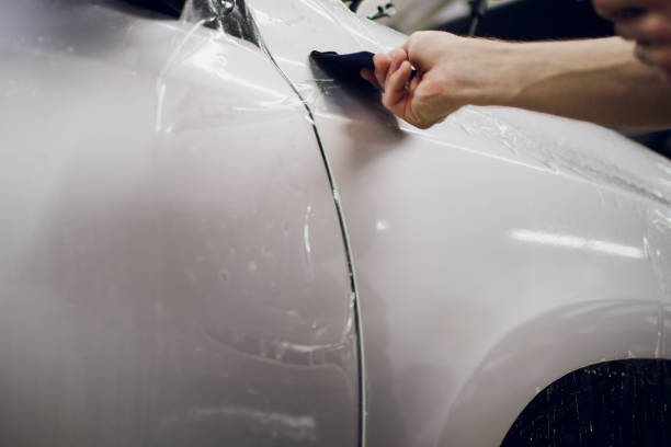 istock Car paint protection, protect coating installation 1148721210
