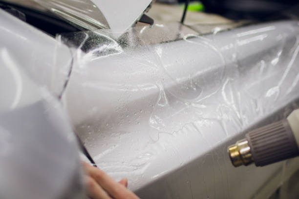 istock Car paint protection, protect coating installation 1148721215