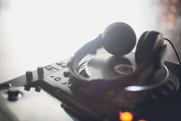 istock DJ playing music at mixer closeup 1148721351