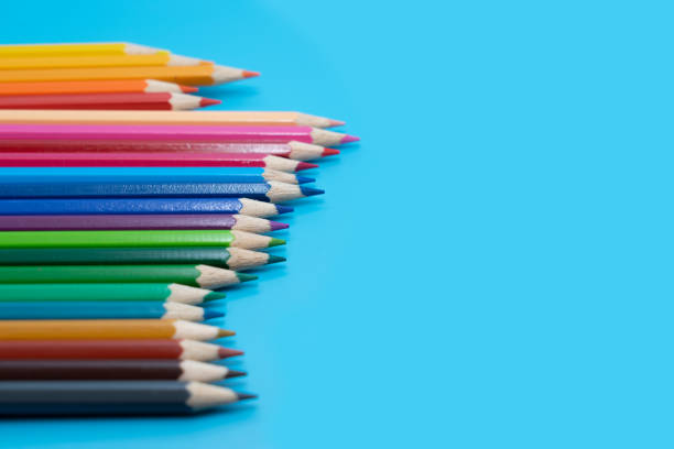 istock Colored pencil on blue background.  Object for kids concept 1148725732