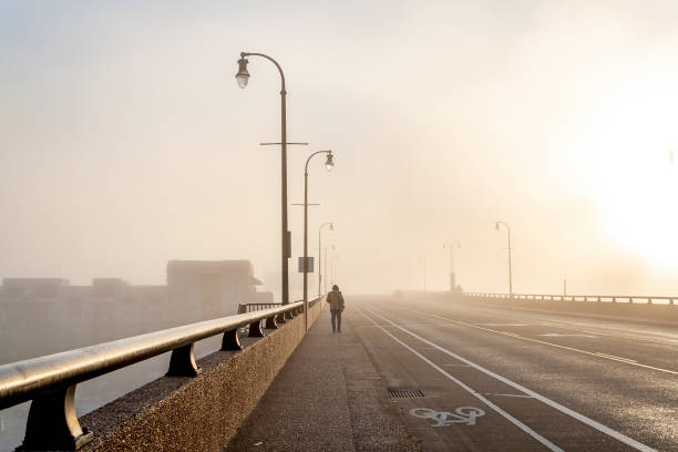 Urban man walking down the street in the morning.