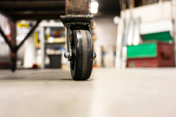 istock Castor - Caster wheels on factory workshop floor 1148736556