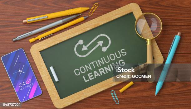 Continuous Learning On Blackboard Stock Photo - Download Image Now - Continuity, Learning, Development