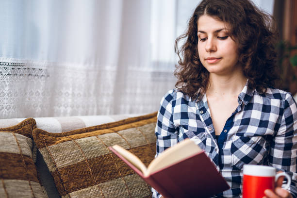 istock Reading book with cup of coffee 1148744776