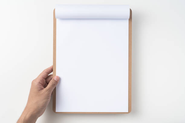 istock white flipped paper on clipboard isolated on white 1148749919