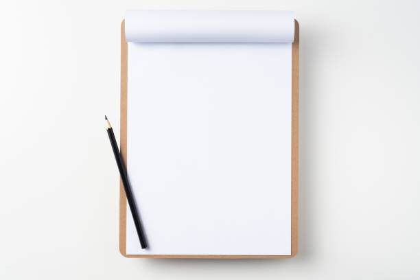 istock white flipped paper on clipboard isolated on white 1148749935