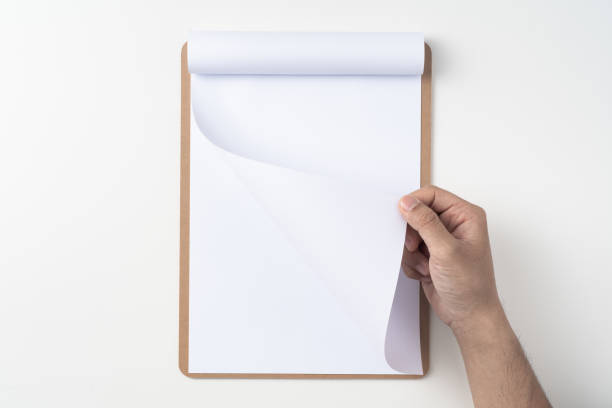 istock white flipped paper on clipboard isolated on white 1148749940