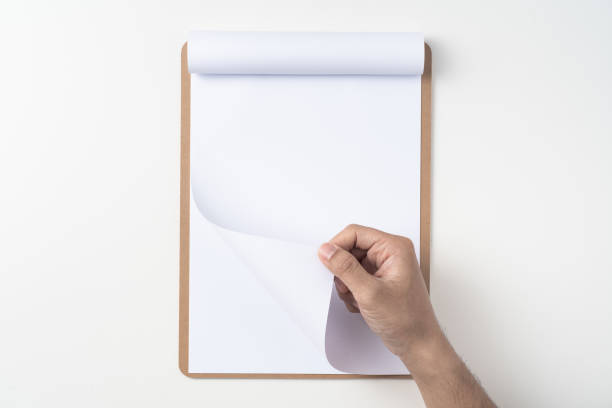 istock white flipped paper on clipboard isolated on white 1148750477