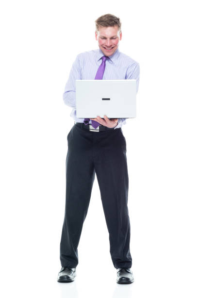 istock Handsome businessman dressed in nice clothing - using a laptop 1148755131