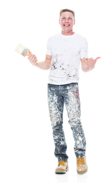 istock Handsome young male painter wearing staned clothes  on white background - shaka sign 1148755227