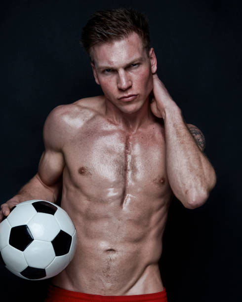 istock Sexy male soccer player 1148756258