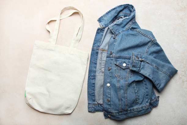 istock denim jacket and white eco bag 1148757115