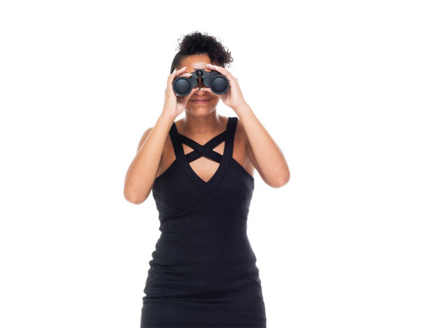 istock Beautifule tall black female wearing a nice black dress - binoculars 1148757280