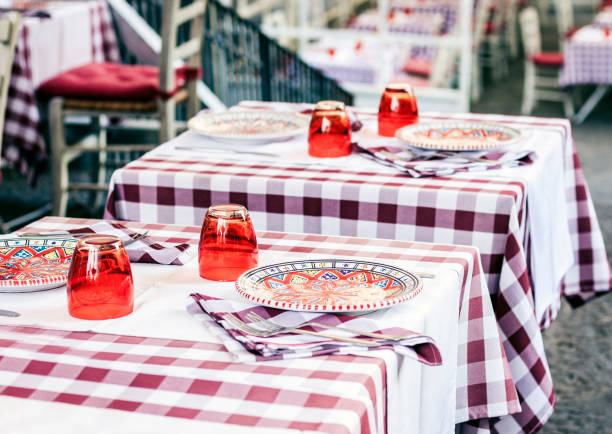istock Serving on the table on terrace in the restaurant in Catania, Sicily, Italy, setting for diner 1148757532