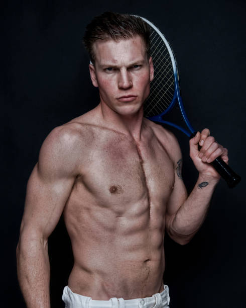 istock Sexy male tennis player 1148757601