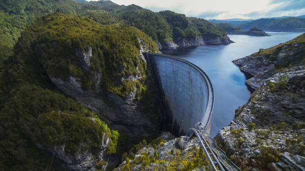 wide view of strathgordon dam in tasmania wide view of the hydro electricity dam at strathgordon in tasmania dam stock pictures, royalty-free photos & images