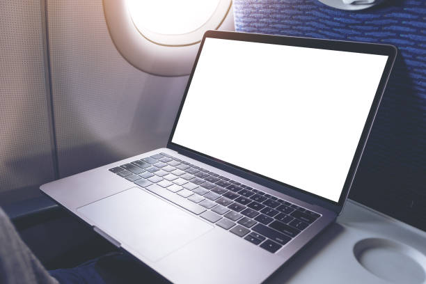 istock laptop computer with blank white desktop screen in the cabin 1148761418