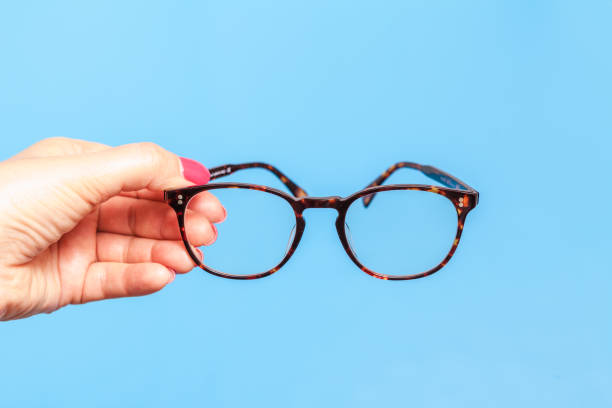 istock Female hand holding Eye Glasses 1148763169