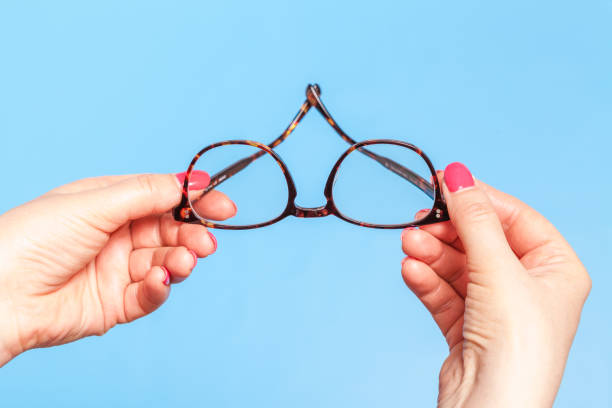 istock ptometrist giving new optical glasses 1148763502