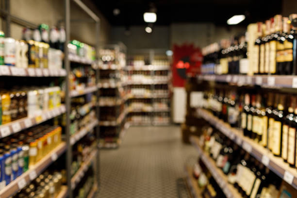 istock supermarket shopping blur background. 1148764980