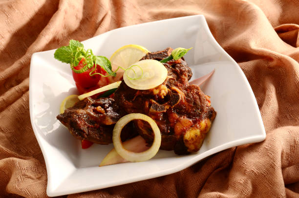 istock spicy grilled oxtail, slightly blackish brown shiny 1148765305