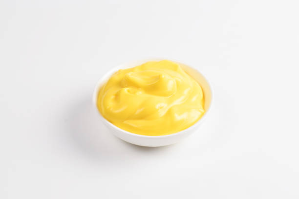 istock Cheese sauce in white plate on white background. 1148767323