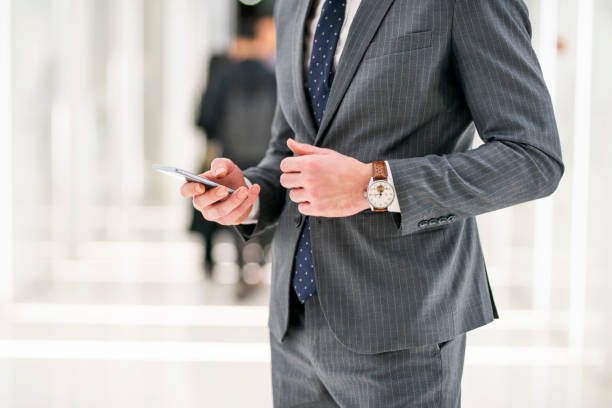 istock Businessman checking his phone 1148771651