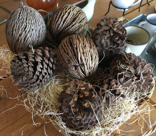 istock Christmas pine cones in a basket 1148772165