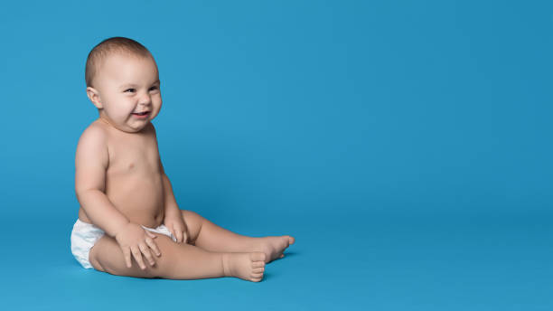 istock Baby boy laughing and looking at copy space 1148772299