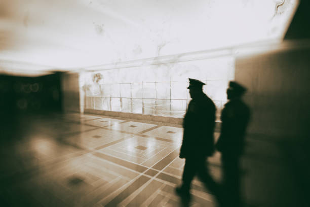 istock Police officers walking inside main station 1148775587