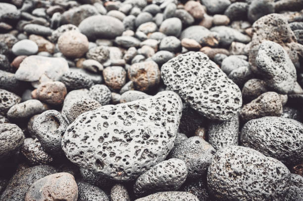 istock Natural background made of volcanic rocks and pebbles. 1148776610