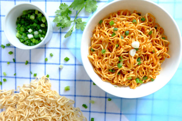 istock Dried instant noodle in white ceramic bowl on tablecloth 1148776865