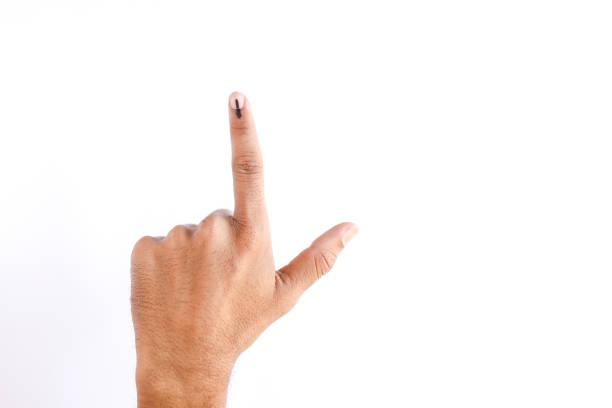 istock Indian Voter Hand with voting sign 1148778314