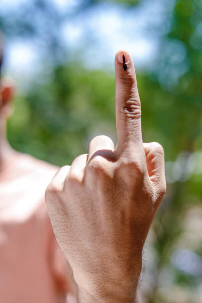 istock Indian Voter Hand with voting sign 1148778761