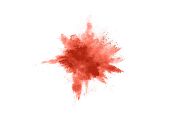 istock living coral color powder explosion on white background. Colored cloud. Colorful dust explode. Paint Holi. 1148781005