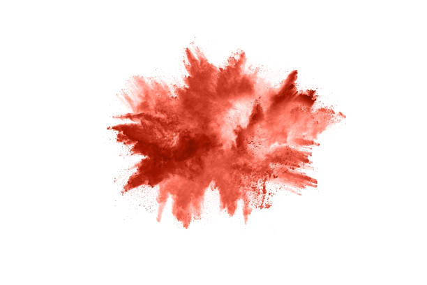 istock living coral color powder explosion on white background. Colored cloud. Colorful dust explode. Paint Holi. 1148781006