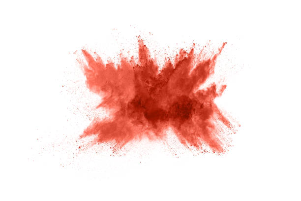 istock living coral color powder explosion on white background. Colored cloud. Colorful dust explode. Paint Holi. 1148781065