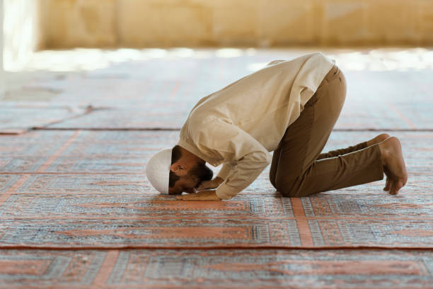 istock Muslim man is praying in mosque 1148781128