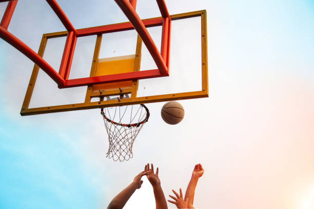 istock Cropped Hands Playing Basketball 1148781633